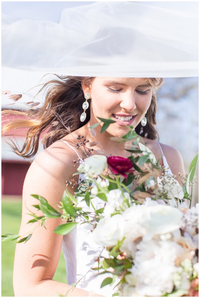 Portland, Maine wedding inspiration shoot at William Allen Farm with photography by halie. Floral design by Honeysuckle Way. Model Kaitlyn Beckwith and gown provided by Andrea's Bridal. Hair & Makeup by Sarah and Co. Designs.