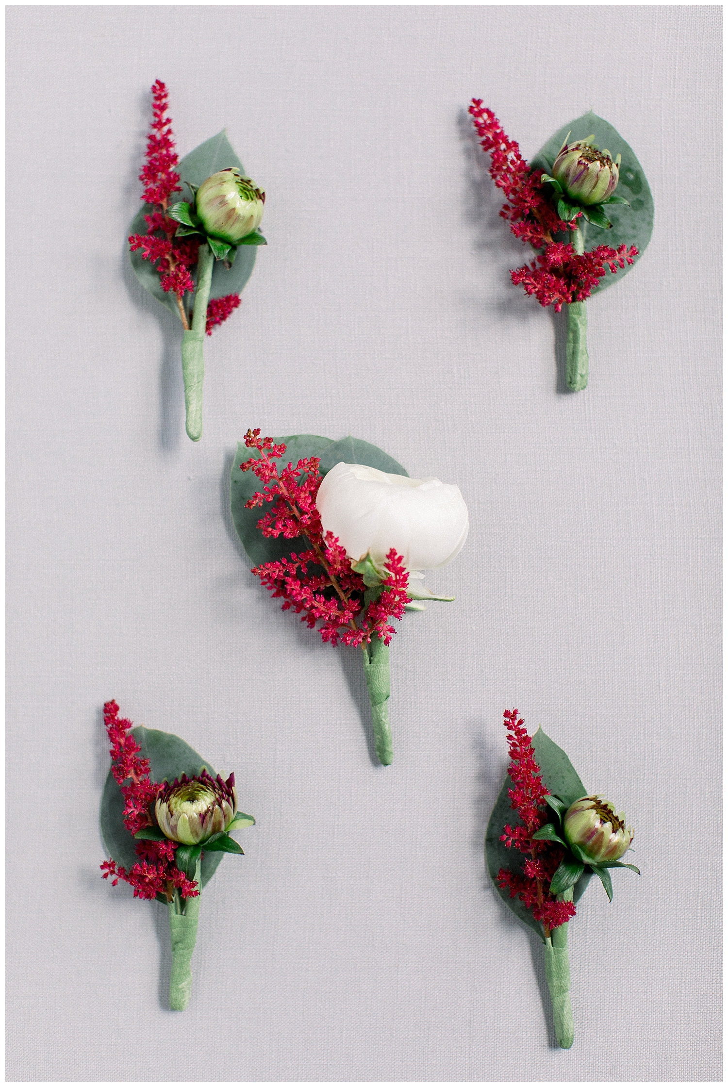 Boutonniere design by Skowhegan Fleuriste in Maine. Sugarloaf Mountain Resort Wedding in Maine, photos by Halie Olszowy.