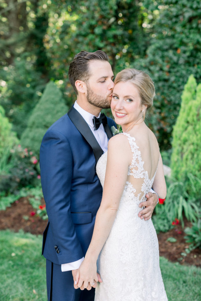 Bedford Village Inn NH Wedding first look Essence of Australia dress and groom's suite from JoS. A. Bank
