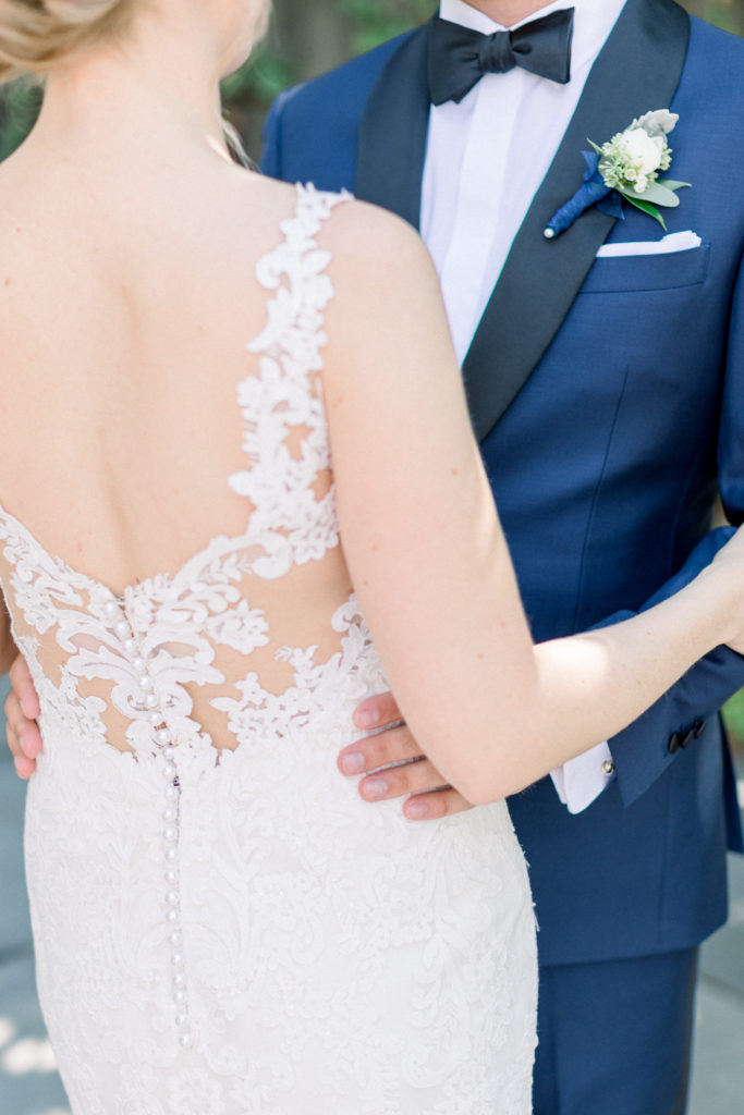Bedford Village Inn NH Wedding first look Essence of Australia dress and groom's suite from JoS. A. Bank