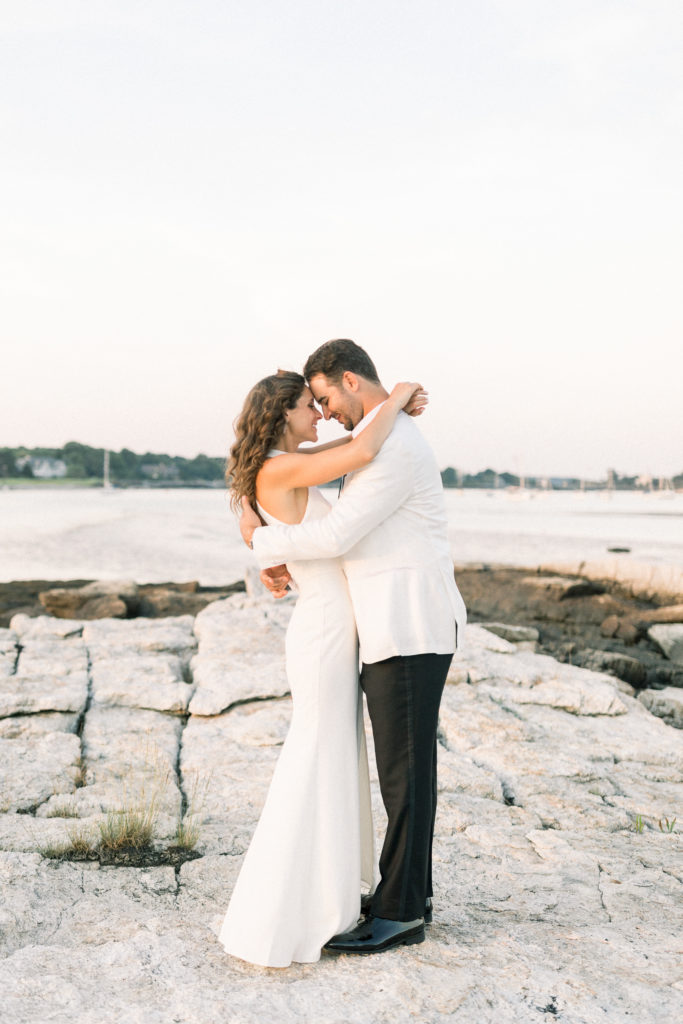 Wentworth by the Sea Country Club Rye NH wedding, BHLDN reception dress, Indochino white tux, ocean sunset photos