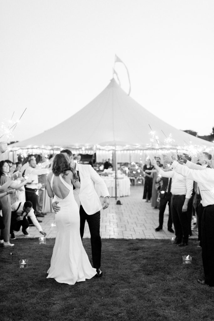 Wentworth by the Sea Country Club Rye NH wedding, BHLDN reception dress, Indochino white tux, Sperry sailcloth tent sparkler exit