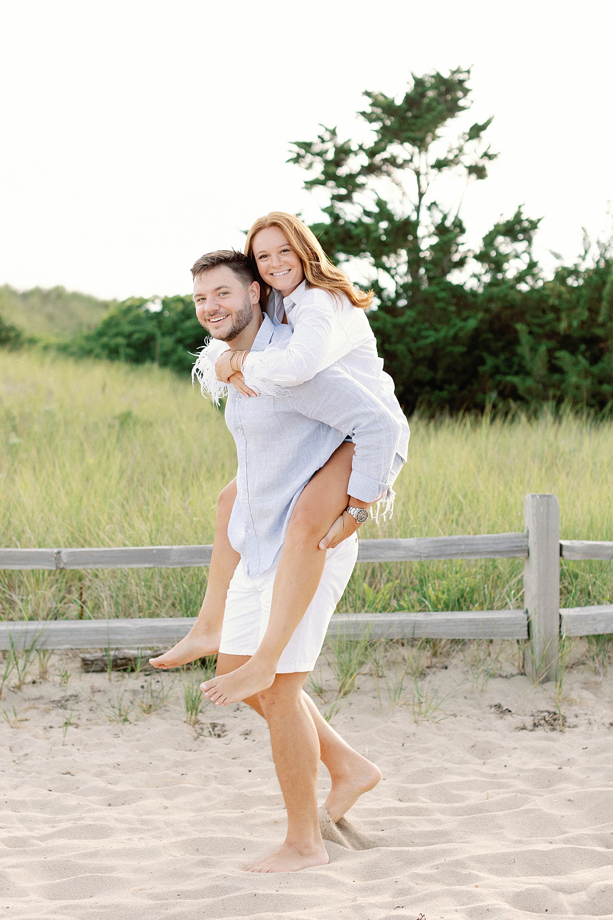 Piggyback pose for engagement photos