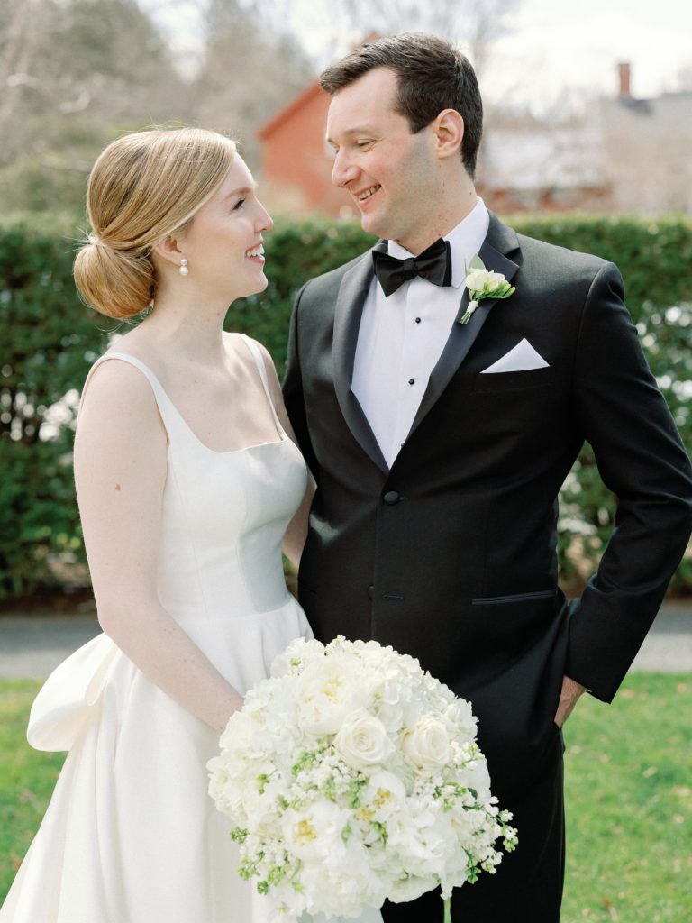 Bride and groom portrait for spring wedding at the Woodstock Inn in Vermont