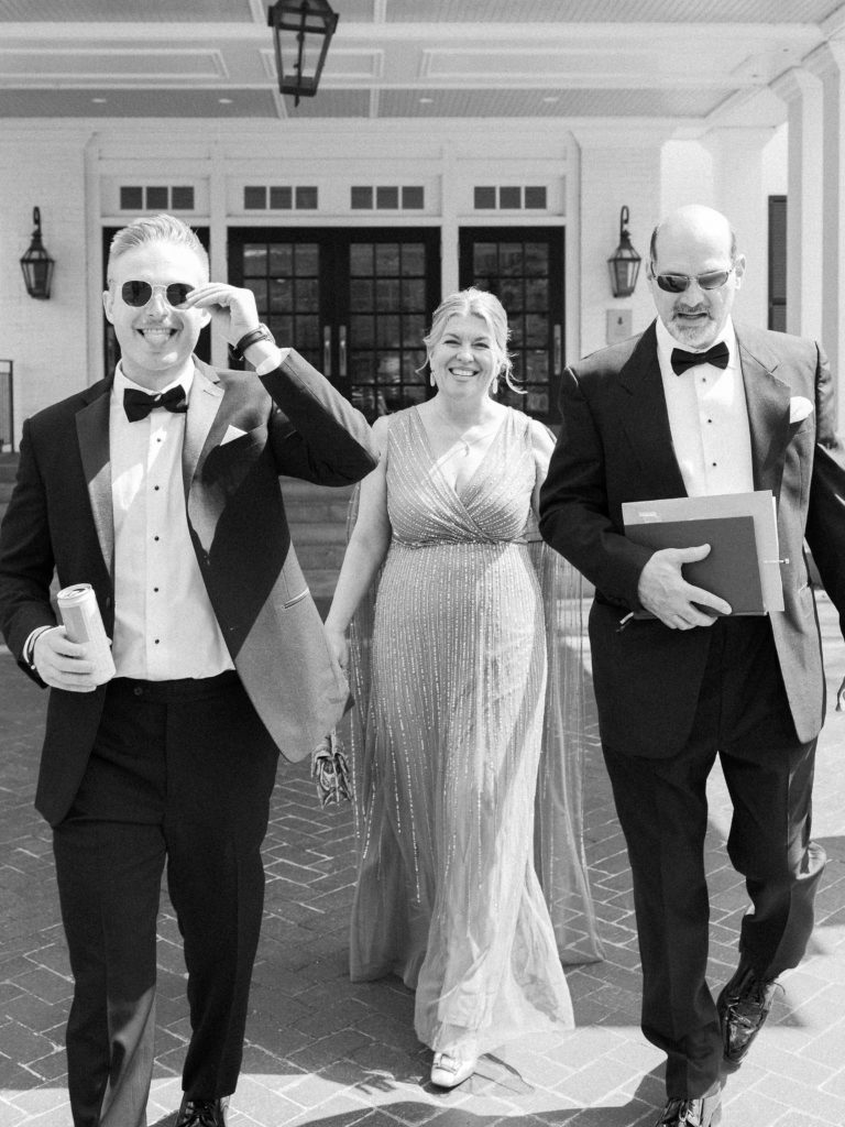 Candid black and white photo of family member on wedding day