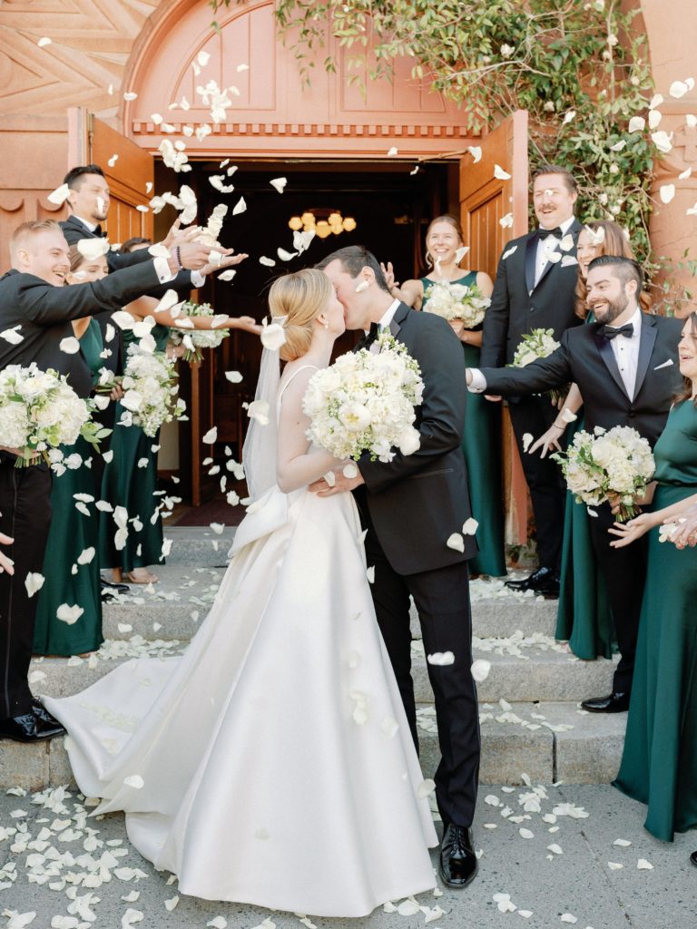Bride and groom exit at Our Lady of the Snows Church in Woodstock, VT
