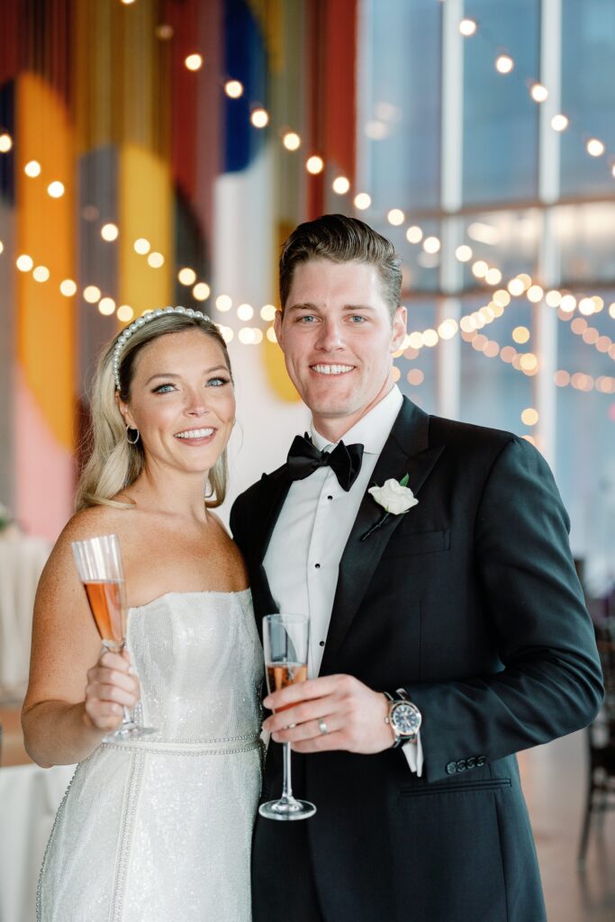 Bride and groom at cocktail hour at Boston's Institute of Contemporary Art