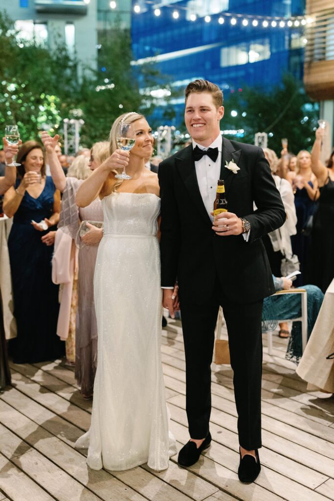 Bride and groom at cocktail hour at Boston's Institute of Contemporary Art