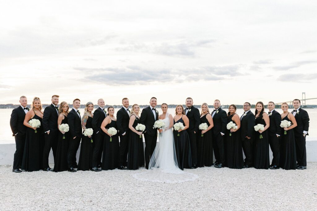 Wedding party beach portrait during Belle Mer wedding in Newport, RI