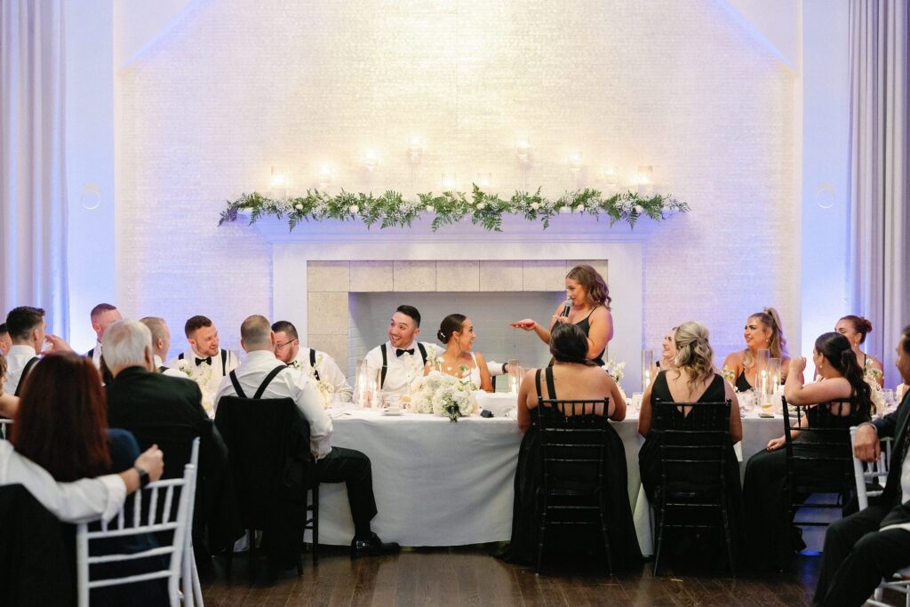 Maid of Honor giving a toast at head table during Newport wedding