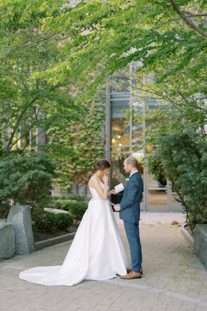 Bride and groom exchanging private vows during first look