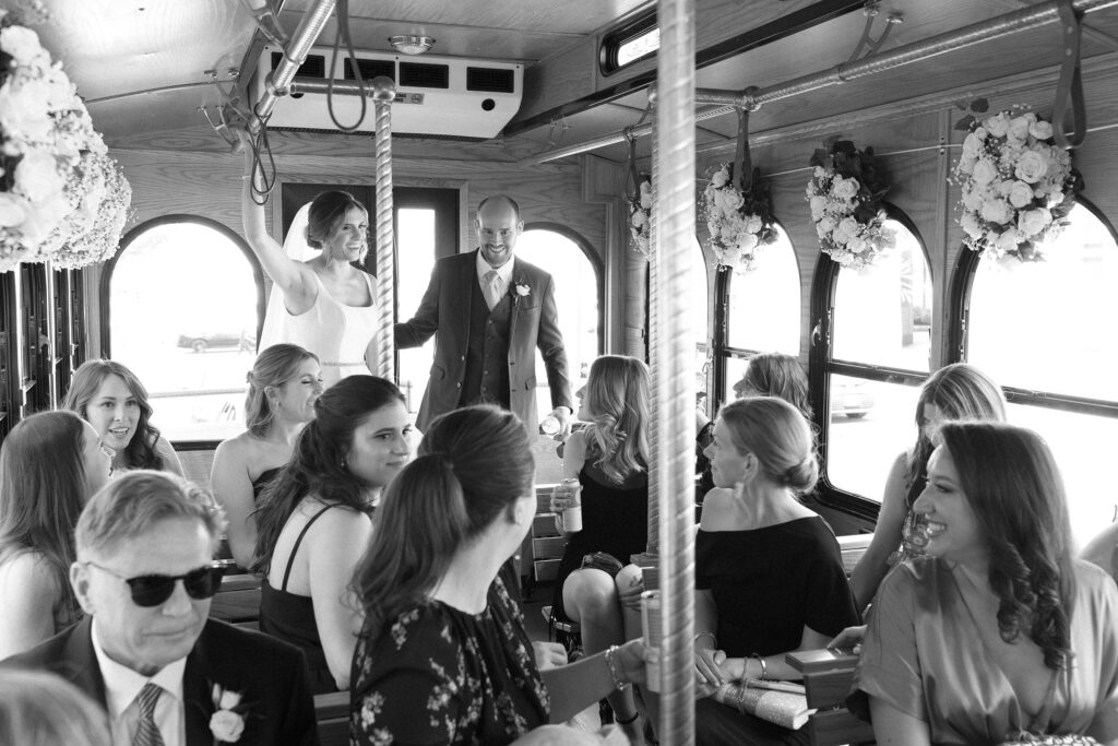 Bride and groom on trolly in Boston