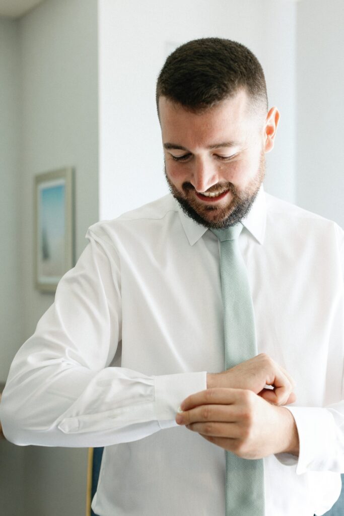 Groom getting ready portrait for Plymouth wedding