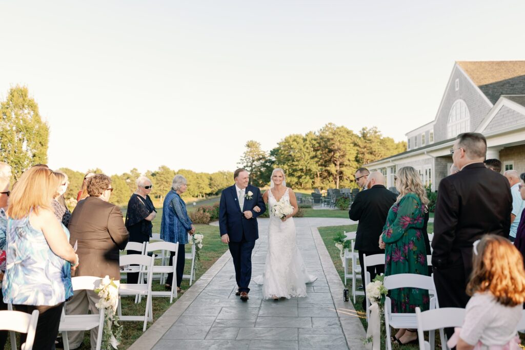 Bride and groom walking down the aisle outdoor ceremony at Waverly Oaks Golf Club