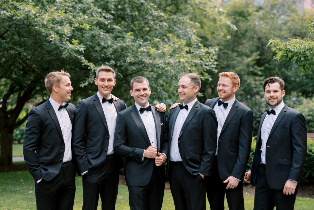 Groom and groomsmen portrait before Back Bay wedding in Boston Public Garden