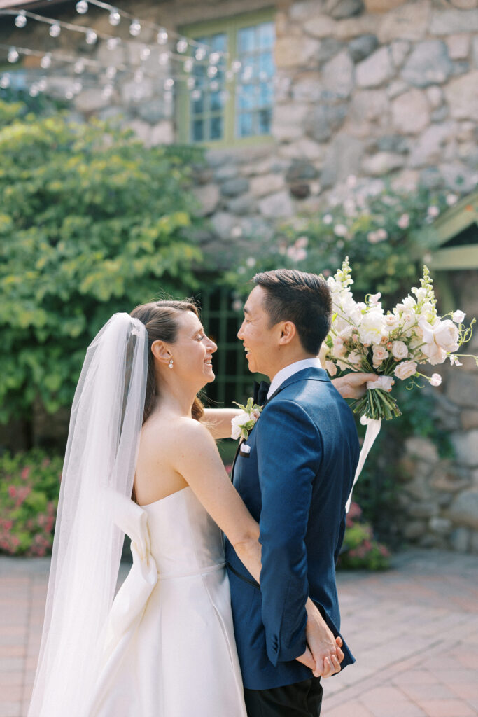 Bride and groom candid portrait before wedding ceremony
