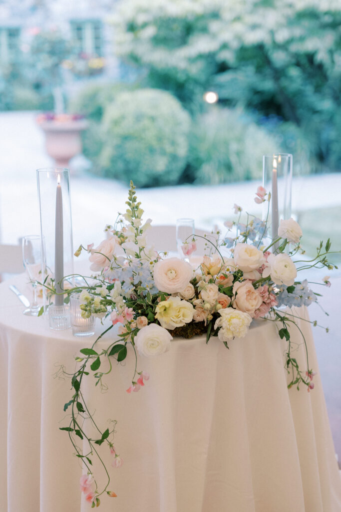 Close up of flowers at wedding head table