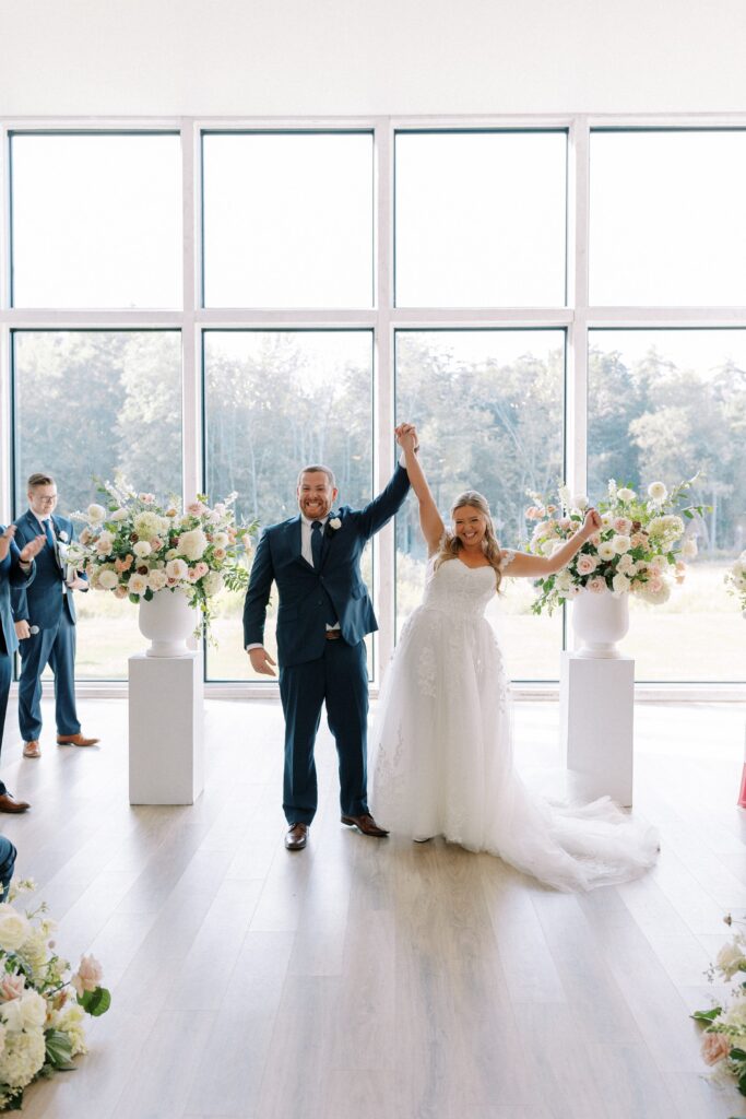 Indoor ceremony at The Greenery at McKenzie's Farm Wedding
