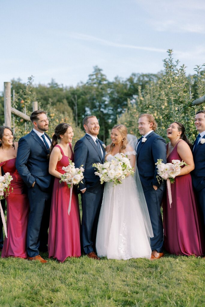 Wedding party portrait in the orchard at The Greenery at McKenzie's Farm Wedding