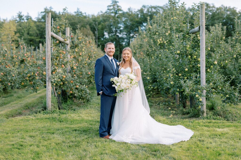 Bride and groom portrait in the orchard at The Greenery at McKenzie's Farm Wedding