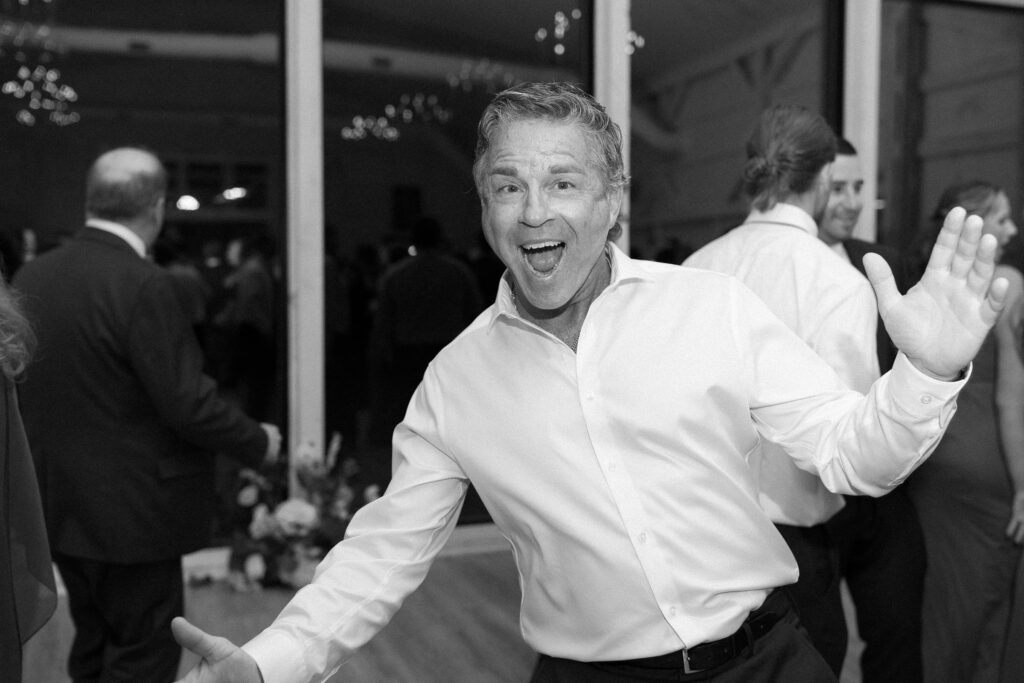Candid black and white wedding photos of guests at The Greenery at McKenzie's Farm