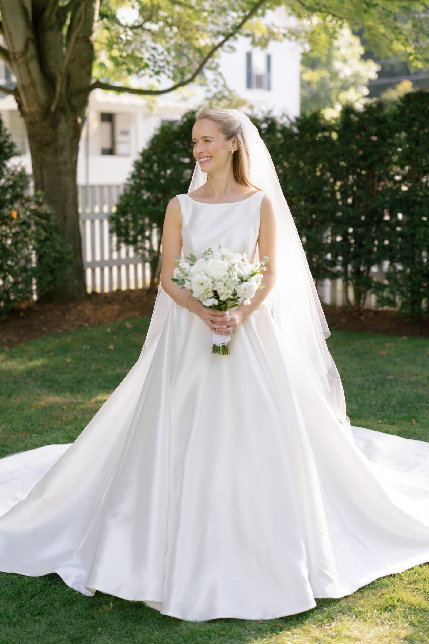 Bride wearing a boatneck Sareh Nouri wedding gown