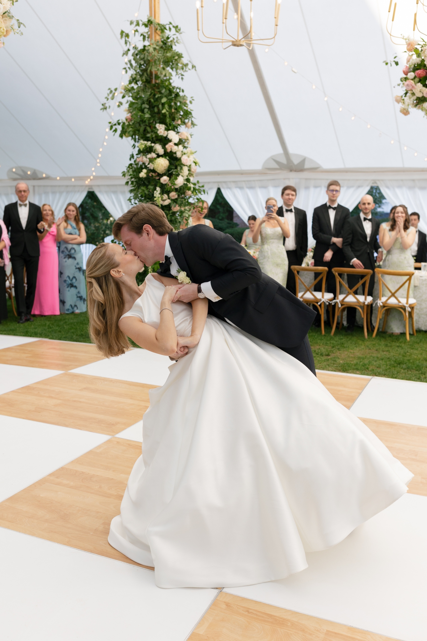 Groom dipping his bride for a kiss