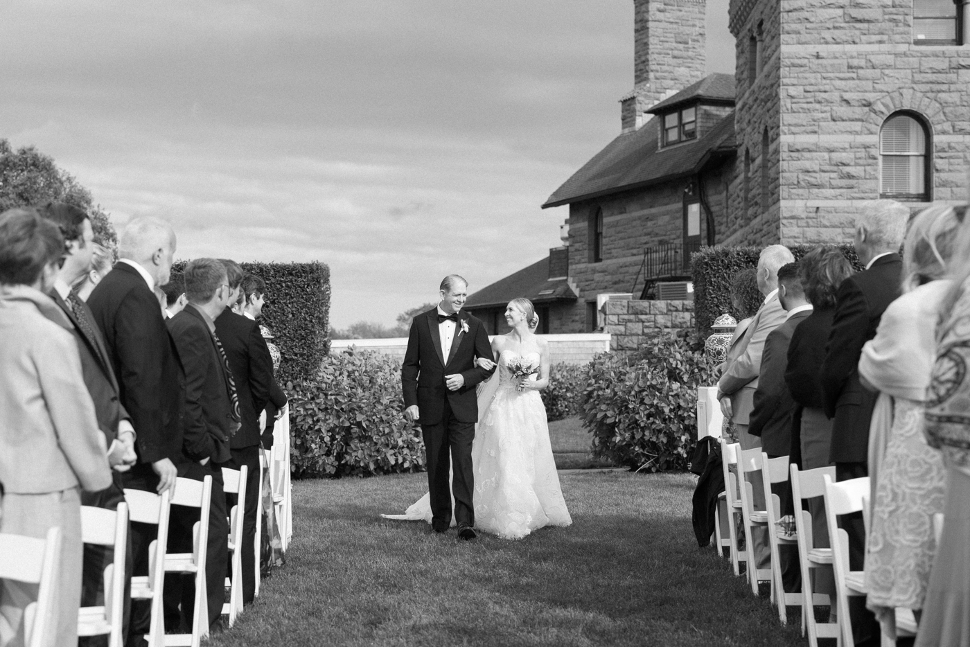 Bride and father walking down the aisle