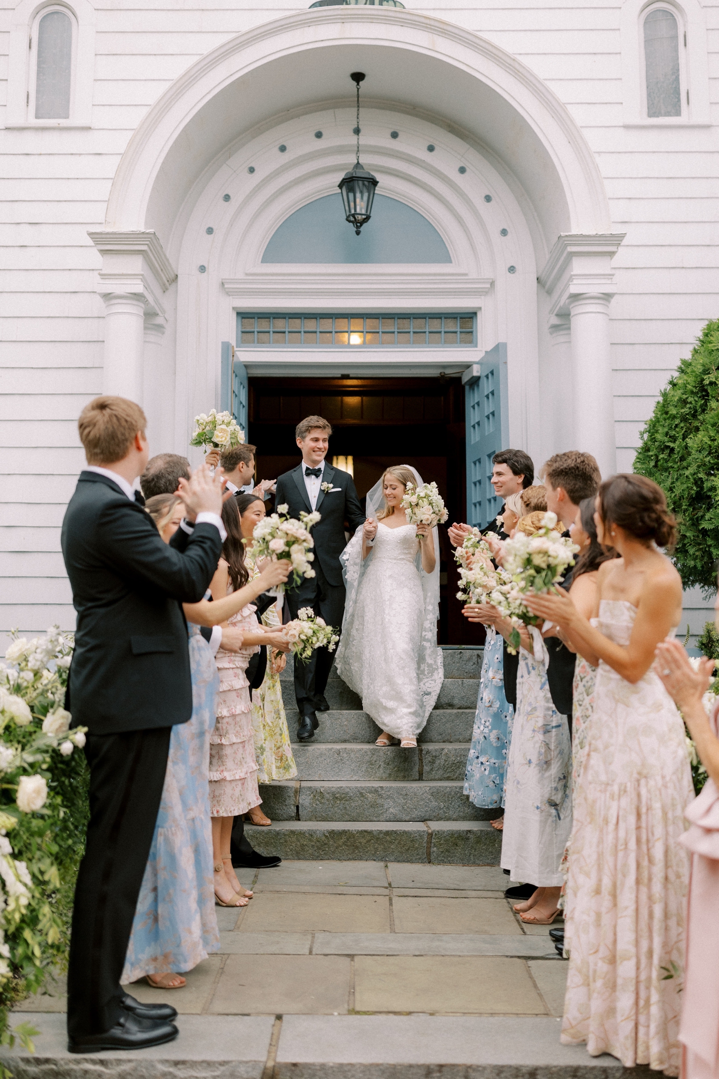 Bride and groom exiting their wedding ceremony at Saint Elizabeth's Church