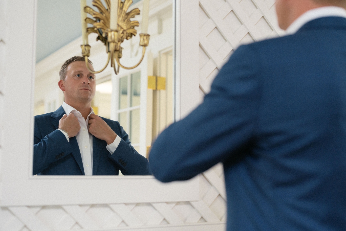 Groom getting ready for his wedding at the Wianno Club
